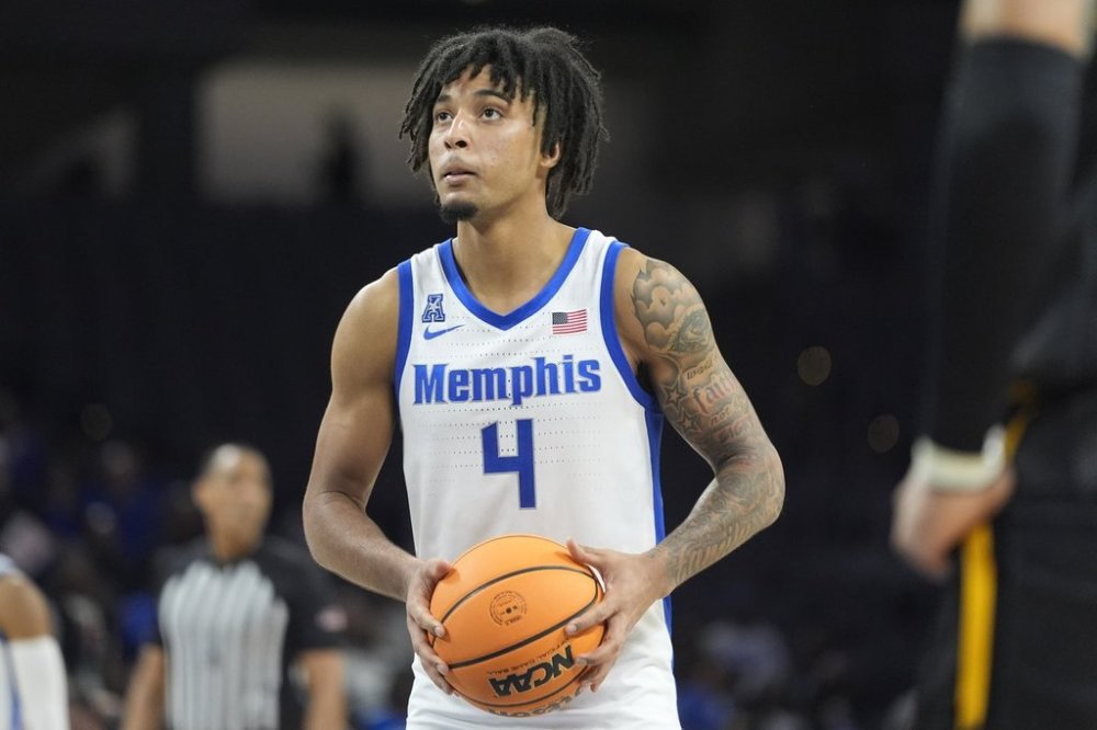Memphis guard PJ Haggerty prepares for a free throw during the second half of an NCAA college basketball game against Wichita State in the quarterfinal of the American Athletic Conference tournament in Fort Worth, Texas, Friday, March 14, 2025. (AP Photo/LM Otero)
