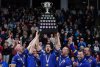 Alberta-Jacobs skip Brad Jacobs, from left to right, third Marc Kennedy, second Brett Gallant, and lead Ben Hebert hoist the Brier tankard after defeating Manitoba-Dunstone during the final at the Brier in Kelowna, B.C., on Sunday, March 9, 2025. THE CANADIAN PRESS/Darryl Dyck