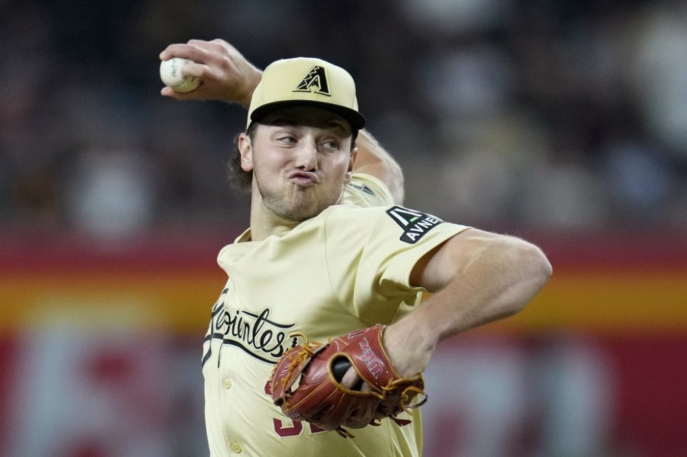 FILE - Arizona Diamondbacks starting pitcher Brandon Pfaadt throws against the San Francisco Giants during the first inning of a baseball game, in Phoenix, Sept. 24, 2024. (AP Photo/Ross D. Franklin, File)