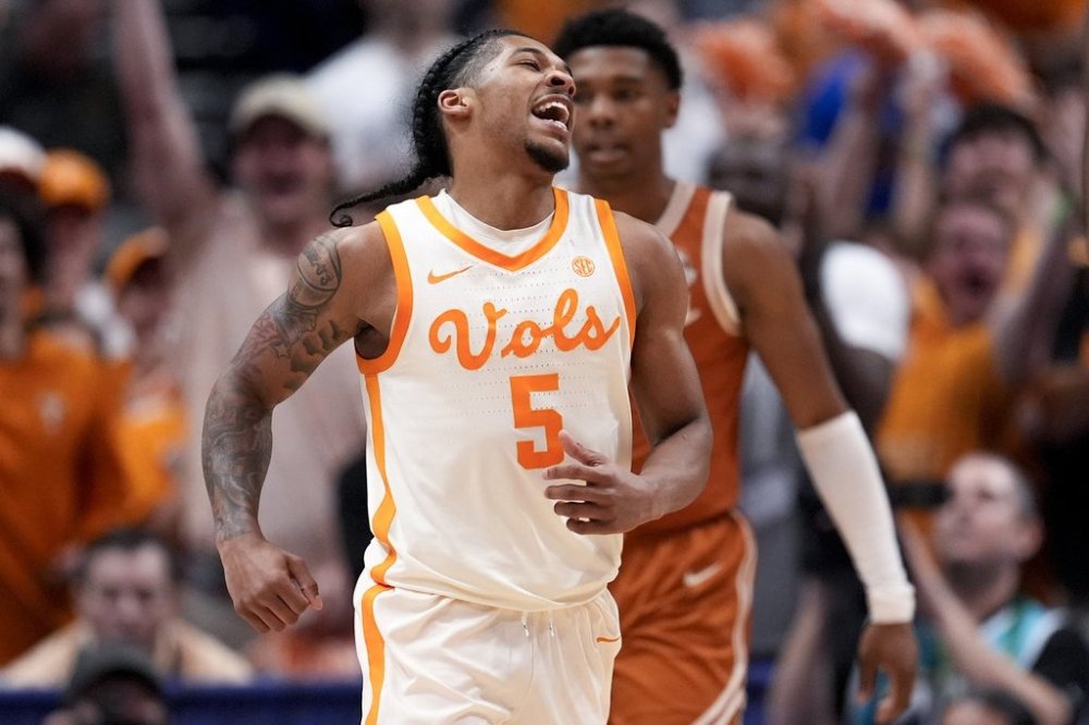 Tennessee guard Zakai Zeigler (5) reacts to play against the Texas during the second half of an NCAA college basketball game in the quarterfinal round of the Southeastern Conference tournament, Friday, March 14, 2025, in Nashville, Tenn. (AP Photo/George Walker IV)