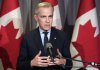 Liberal Leader Mark Carney speaks about new tariffs imposed by U.S. President Donald Trump during a press conference in Kitchener, Ont. on Wednesday, March 26, 2025. THE CANADIAN PRESS/Frank Gunn