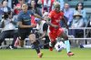 FILE - Kansas City Current forward Temwa Chawinga (6) and Portland Thorns FC defender Reyna Reyes (2) chase after the ball during an NWSL soccer match at CPKC Stadium, March 16, 2024, in Kansas City, Mo. (AP Photo/Reed Hoffmann, File)