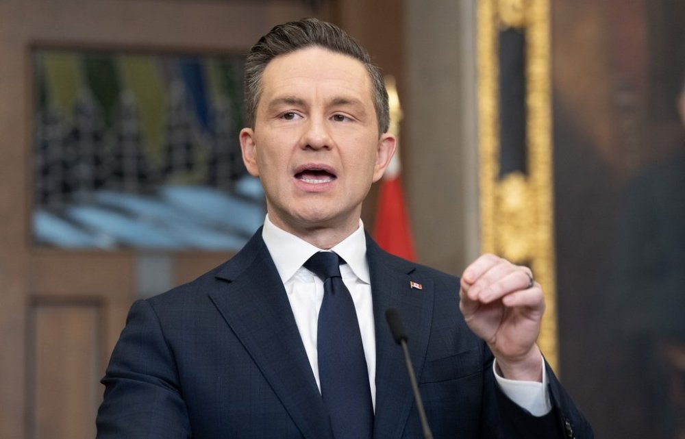 Conservative leader Pierre Poilievre speaks with media in the foyer of the House of Commons on Monday, March 10, 2025 in Ottawa. THE CANADIAN PRESS/Adrian Wyld