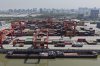 An aerial view of Xiasha Container Terminal on a canal in Hangzhou in east China's Zhejiang province Sunday, April 06, 2025. (Chinatopix Via AP)