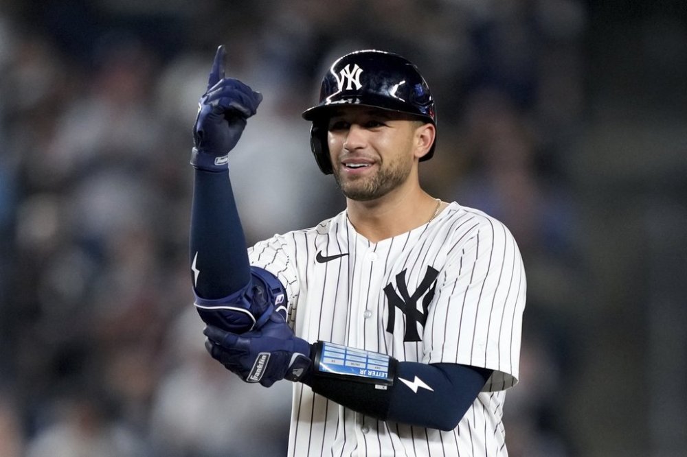 New York Yankees' J.C. Escarra reacts after doubling on a line drive during the seventh inning of a baseball game against the Arizona Diamondbacks, Thursday, April 3, 2025, in New York. (AP Photo/Julia Demaree Nikhinson)