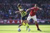 Nottingham Forest's Chris Wood, right, and Manchester City's Ruben Dias vie for the ball during the English Premier League soccer match between Nottingham Forest and Manchester City at the City Ground stadium, in Nottingham, England, Saturday, March 8, 2025. (AP Photo/Rui Vieira)
