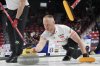 Canada skip Brad Jacobs throws a stone during World Men's Curling Championship action against Norway, in Moose Jaw, Sask., Wednesday, April 2, 2025. Canada's Brad Jacobs defeated China's Xiaoming Xu 8-2 in the early draw at the BKT World Men's Curling Championship. THE CANADIAN PRESS/Chris Young
