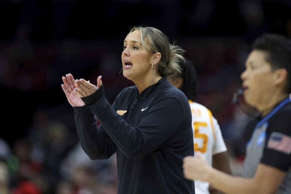 Tennessee head coach Kim Caldwell calls out a play during the first quarter against South Florida as part of the first round of the NCAA college basketball tournament, Friday, March 21, 2025, in Columbus, Ohio. (AP Photo/Joe Maiorana)