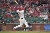 St. Louis Cardinals' Nolan Arenado (28) hits a solo home run during the eighth inning of a baseball game against the Minnesota Twins, Thursday, March 27, 2025, in St. Louis. (AP Photo/Michael Thomas)