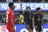 Mexico's Raul Jimenez, center, celebrates with Mexico's Jesus Gallardo, right, after he scored against Panama during the first half of a CONCACAF Nations League final soccer match Sunday, March 23, 2025, in Inglewood, Calif. (AP Photo/Etienne Laurent)