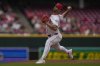 Cincinnati Reds pitcher Nick Martinez throws in the first inning of a baseball game against the San Francisco Giants, Sunday, March 30, 2025, in Cincinnati. (AP Photo/Carolyn Kaster)
