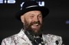 FILE - Boxer Tyson Fury speaks during a press conference in Riyadh, Saudi Arabia, Thursday, Dec. 19, 2024 ahead of the WBA, WBO, and WBC heavyweight title bout between Britain's Tyson Fury and Ukraine's Oleksandr Usyk. (AP Photo/Frank Augstein, File)