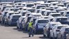 New German cars are stored at a logistic center in Duisburg, Germany, Thursday, March 27, 2025. (AP Photo/Martin Meissner)