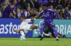 Toronto FC defender Henry Wingo, left, and Orlando City forward Iván Angulo fight for the ball during the second half of an MLS soccer match, Saturday, March 1, 2025, in Orlando, Fla. (AP Photo/Kevin Kolczynski)