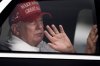 President Donald Trump waves to supporters from his limousine as he arrives at Trump International Golf Club, Saturday, March 29, 2025, in West Palm Beach, Fla. (AP Photo/Manuel Balce Ceneta)