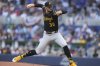 Pittsburgh Pirates pitcher Paul Skenes (30) throws during first inning the of an opening-day baseball game against the Miami Marlins, Thursday, March 27, 2025, in Miami. (AP Photo/Lynne Sladky)