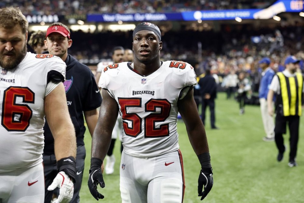 FILE -Tampa Bay Buccaneers linebacker K.J. Britt (52) walks off the field during an NFL football game against the New Orleans Saints, Sunday, Oct. 13, 2024, in New Orleans. (AP Photo/Tyler Kaufman, File)