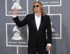 FILE - Val Kilmer arrives at the 54th annual GRAMMY Awards, Feb. 12, 2012, in Los Angeles. (AP Photo/Chris Pizzello, File)