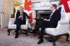 Prime Minister Mark Carney, left, speaks with British Prime Minister Keir Starmer in London on Monday, March 17, 2025. THE CANADIAN PRESS/Sean Kilpatrick