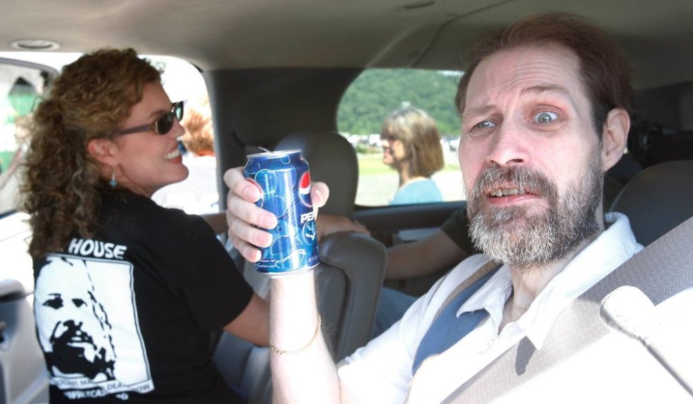FILE - Paul Gregory House, 46, who was on death row for 22 years after being convicted in 1986 of murdering Carolyn Muncey in East Tennessee, hoist his drink after seeing a