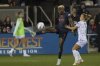 Bay FC forward Racheal Kundananji (9) kicks the ball as Racing Louisville defender Lauren Milliet (2) defends during the second half of an NWSL soccer match in San Jose, Calif., Saturday, March 22, 2025. (Stephen Lam/San Francisco Chronicle via AP)