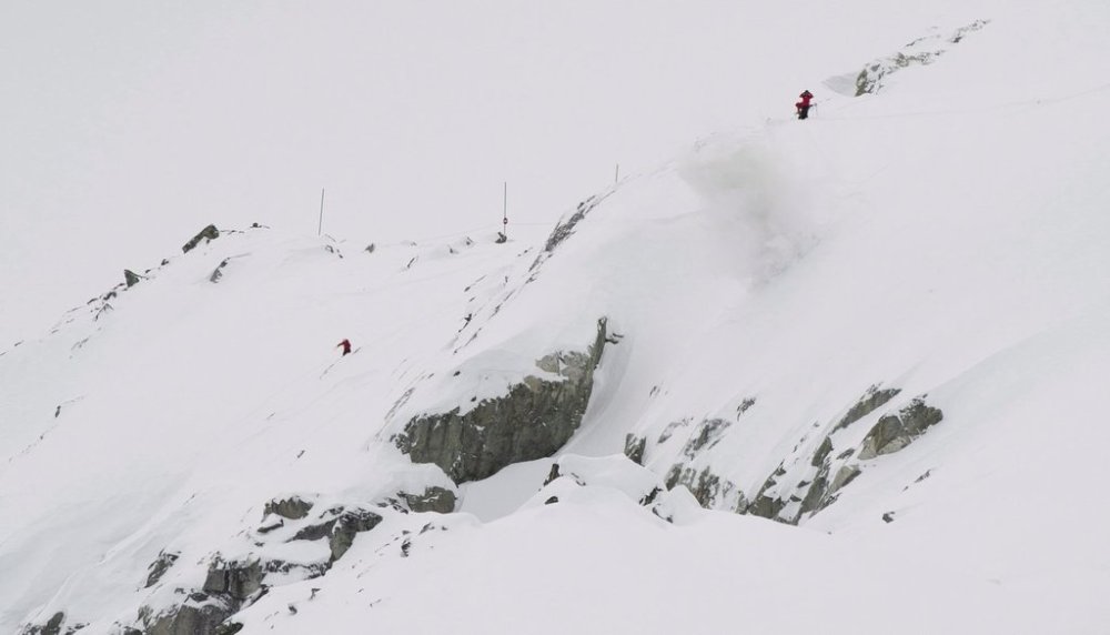 Blackcomb mountain ski patrollers set off an explosive to clear the mountain of avalanche dangers on Blackcomb in Whistler, B.C., Dec. 21, 2012. THE CANADIAN PRESS/Jonathan Hayward
