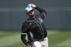 Arizona Diamondbacks starting pitcher Jordan Montgomery warms up during the second inning of a spring training baseball game against the Colorado Rockies Wednesday, March 19, 2025, in Scottsdale, Ariz. (AP Photo/Ross D. Franklin)