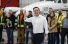Conservative Leader Pierre Poilievre greets aircraft mechanics and supporters during a press conference at Fast Air in Winnipeg on Saturday, March 29, 2025.  CANADIAN PRESS/John Woods