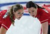 Team Canada lead Briane Harris, left, and third Val Sweeting sweep while playing Prince Edward Island at the Scotties Tournament of Hearts in Kamloops, B.C., on Monday, February 20, 2023. THE CANADIAN PRESS/Darryl Dyck