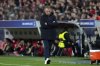 Barcelona's head coach Hansi Flick gestures during the Champions League round of 16 first leg soccer match between SL Benfica and FC Barcelona at the Luz stadium in Lisbon, Wednesday, March 5, 2025. (AP Photo/Armando Franca)