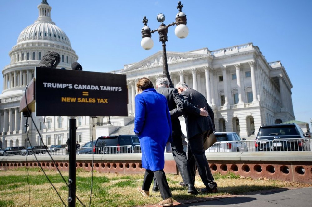 Sen. Amy Klobuchar, D-Minn., left, Sen. Tim Kaine, D-Va., center, and Senate Minority Leader Chuck Schumer, D-N.Y., talk before a news conference regarding President Donald Trump's pending tariffs on Canada, at the Capitol, Tuesday, April 1, 2025, in Washington. (AP Photo/Rod Lamkey, Jr.)