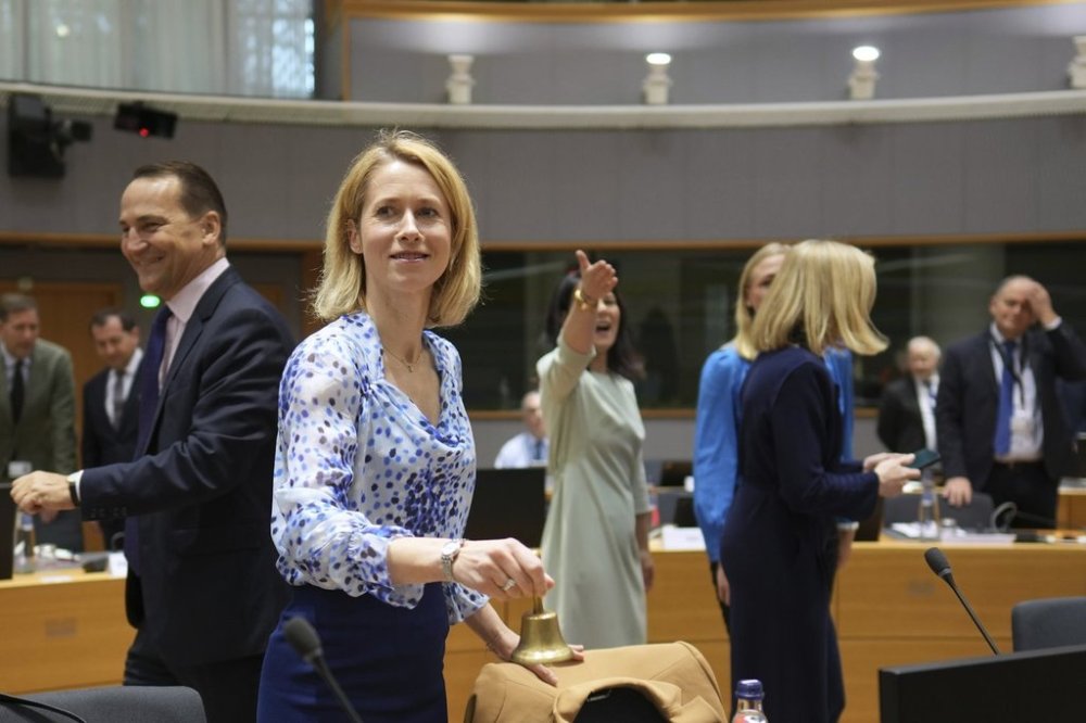 European Union foreign policy chief Kaja Kallas, center, rings a bell to signify the start of a meeting of EU foreign ministers at the European Council building in Brussels, Monday, March 17, 2025. (AP Photo/Virginia Mayo)