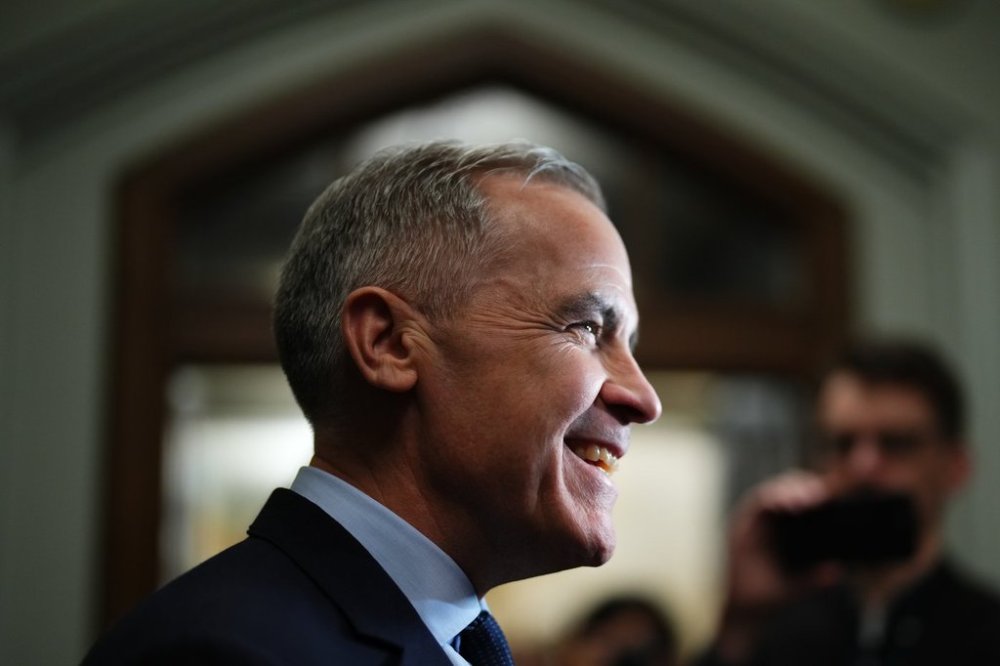 Liberal Leader Mark Carney talks to media as he leaves a caucus meeting in Ottawa, Monday, March 10, 2025. THE CANADIAN PRESS/Sean Kilpatrick