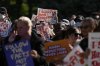 Supporters and harm reduction workers protest outside of the Ontario legislature in Toronto on Monday, October 21, 2024, as groups gather to protest against the Ontario government's proposal to close consumption treatment sites.THE CANADIAN PRESS/Chris Young