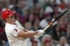 Los Angeles Angels' Mike Trout hits a home run during the fifth inning of a baseball game against the Cleveland Guardians in Anaheim, Calif., Saturday, April 5, 2025. (AP Photo/Eric Thayer)