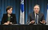 Quebec Economy Minister Christine Fréchette looks on as Quebec Premier François Legault speaks during a news conference in Montreal, Thursday, April 3 2025, following a virtual meeting with provincial counterparts and Prime Minister Mark Carney where they discussed U.S. President Donald Trump’s latest tariffs. THE CANADIAN PRESS/Graham Hughes