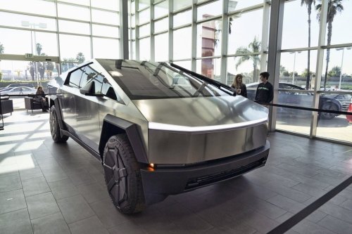 FILE - A Tesla Cybertruck is on display at the Tesla showroom in Buena Park, Calif., Dec. 3, 2023. (AP Photo/Richard Vogel, File)