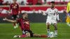 New York Red Bulls defender Alexander Hack, left, fights for the ball against Toronto FC forward Lorenzo Insigne during the first half of an MLS soccer match on Saturday, March 22, 2025, in Harrison, N.J. THE CANADIAN PRESS/AP, Eduardo Munoz Alvarez