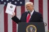 President Donald Trump speaks during an event to announce new tariffs in the Rose Garden at the White House, Wednesday, April 2, 2025, in Washington. The notion that Canadian companies can simply switch supply chains in response to American tariffs is a fantasy, experts say. (AP Photo/Mark Schiefelbein)