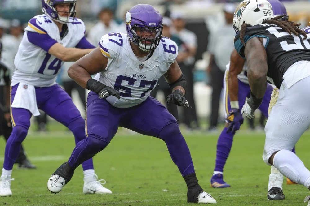 FILE - Minnesota Vikings guard Ed Ingram (67) reacts at the snap during an NFL football game against the Jacksonville Jaguars, Nov. 10, 2024, in Jacksonville, Fla. (AP Photo/Gary McCullough, File)