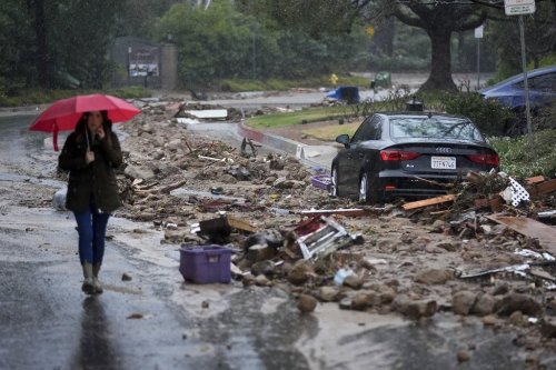FILE - Mud and debris is strewn on Fryman Road during an atmospheric river Feb. 5, 2024, in Studio City Calif. (AP Photo/Marcio Jose Sanchez, File)
