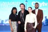 Cast members (left to right) Karen Robinson, Aden Young, Kathleen Munroe, and K.C. Collins pose for a photo at a press junket as they promote the television series 