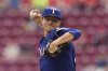 Texas Rangers pitcher Jack Leiter throws in the first inning of a baseball game against the Cincinnati Reds, Wednesday, April 2, 2025, in Cincinnati. (AP Photo/Carolyn Kaster)