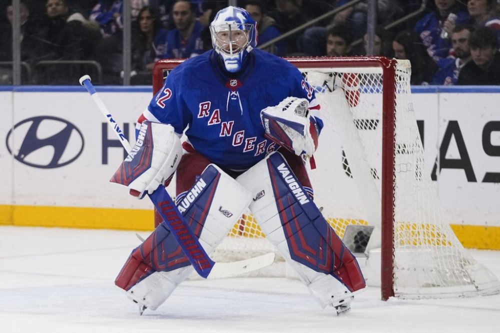 FILE - New York Rangers goaltender Jonathan Quick protects the net during the second period of an NHL hockey game against the Vegas Golden Knights Feb. 2, 2025, in New York. (AP Photo/Frank Franklin II, file)