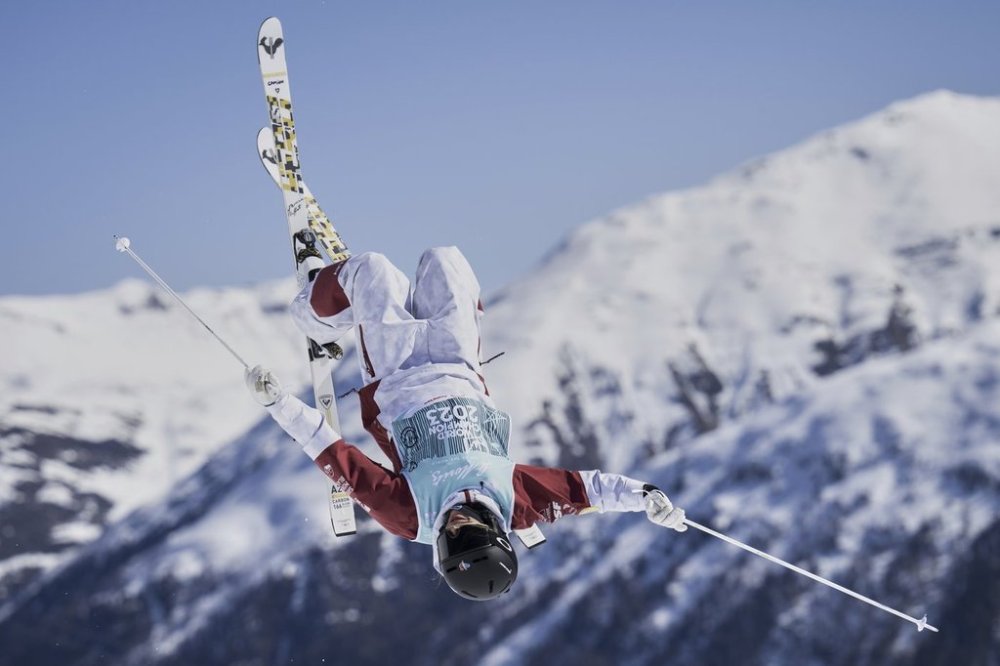 France's Perrine Laffont competes in the women's moguls at the Freestyle World Championships in St. Moritz, Switzerland, Wednesday, March 19, 2025. (Gian Ehrenzeller/Keystone via AP)