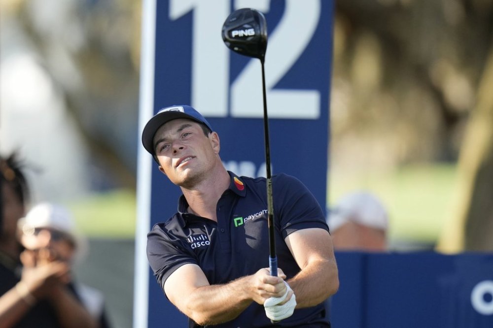 Viktor Hovland watches his tee shot on the 12th hole during the first round of The Players Championship golf tournament Thursday, March 13, 2025, in Ponte Vedra Beach, Fla. (AP Photo/Chris O'Meara)