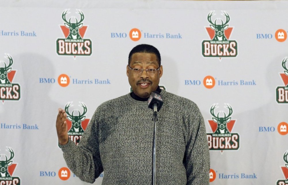 FILE - Former Milwaukee Bucks player Junior Bridgeman talks to the media before an NBA basketball game between the Bucks and Brooklyn Nets, March 1, 2014, in Milwaukee. (AP Photo/Jeffrey Phelps, File)