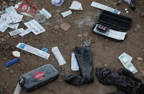 Naloxone kits lie on the ground at a homeless encampment in Edmonton in this file photo from on Friday, December 29, 2023. THE CANADIAN PRESS/Jason Franson