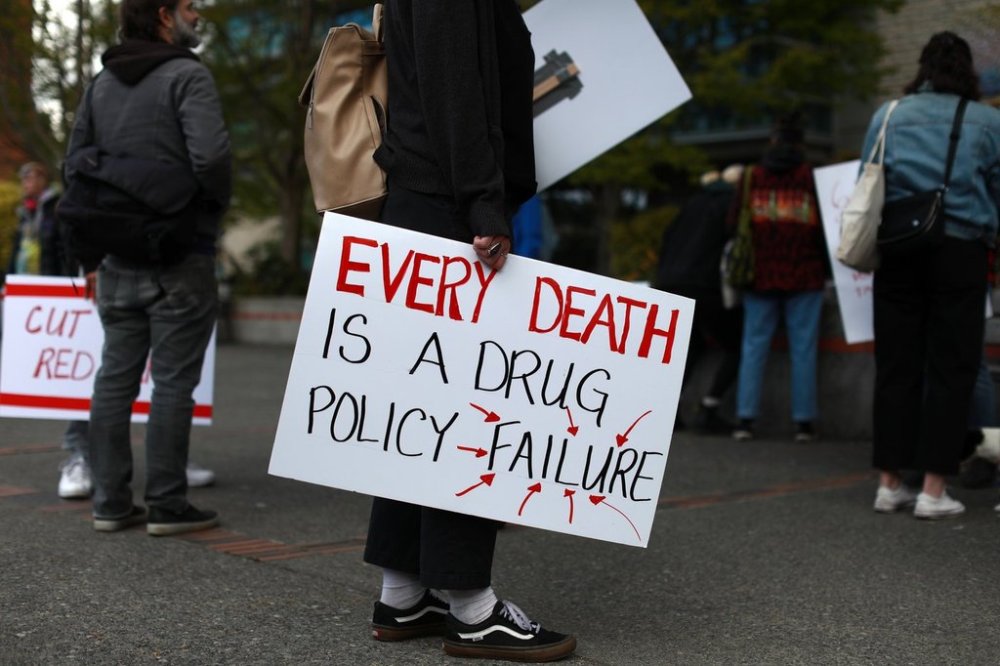 The British Columbia coroner says 152 people died of toxic drug overdoses in January, marking four consecutive months that the toll was under 160. People take part in a rally to mark the public health emergency of the declaration due to the significant increase in opioid-related overdoses across the province in Victoria on April 14, 2022. THE CANADIAN PRESS/Chad Hipolito