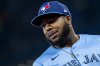 Blue Jays first baseman Vladimir Guerrero Jr. (27) looks on prior to MLB baseball action against the Washington Nationals in Toronto on Monday, March 31, 2025. THE CANADIAN PRESS/Thomas Skrlj